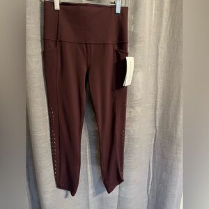 Athleta Salutation Stash Pocket II Laser Cut 7/8 Tight, NWT